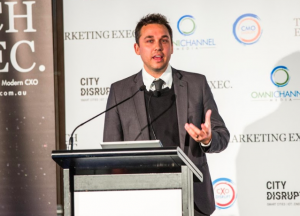 Joel Deutscher presenting 'Don't Let Performance Disrupt You' at CxO Disrupt Sydney